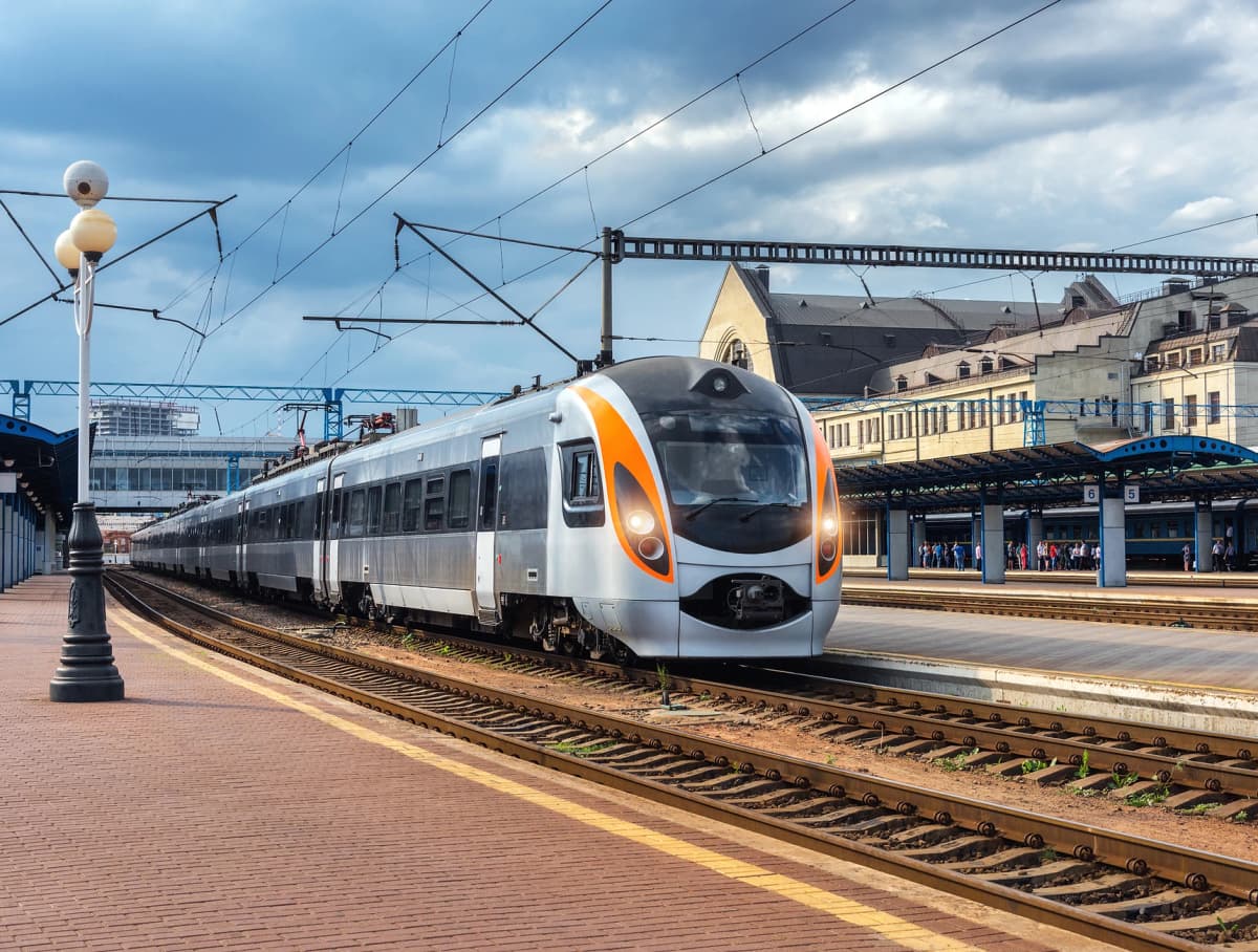 modern passenger train running on tracks